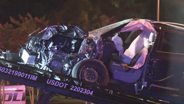 Woman extricated from car after slamming into traffic light pole | khou.com