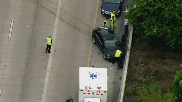 18-wheeler cargo hits overpass on Katy Freeway near downtown | khou.com