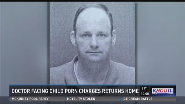Doctor facing child porn charges returns home